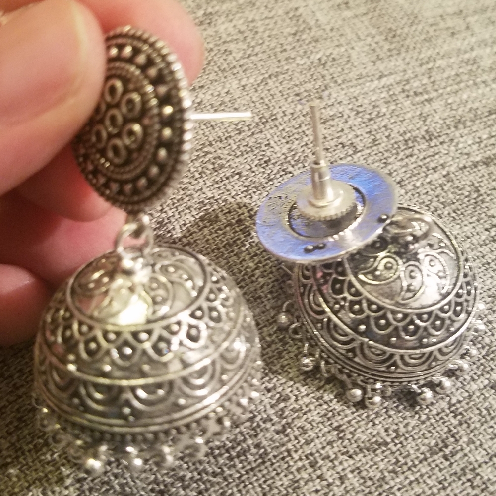 Silver pair of earrings for Indian celebration